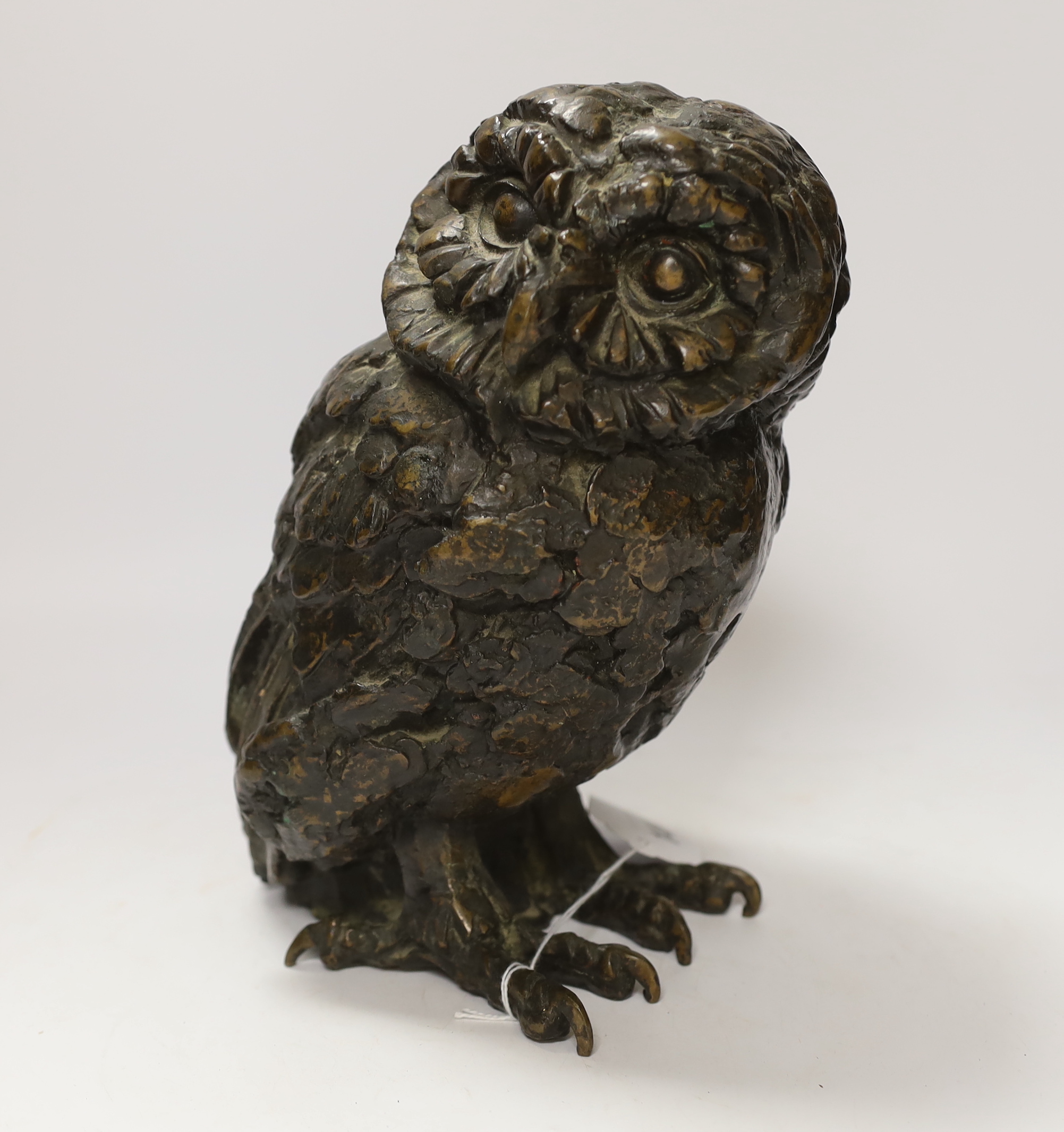 A bronze study of an owl, indistinctly signed, 24cm high